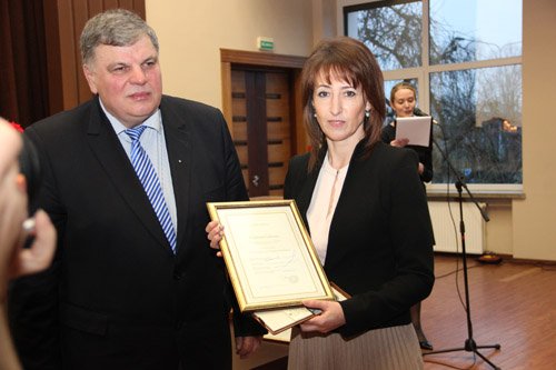 Konsultantų vadovė medalius kabintų ūkininkams