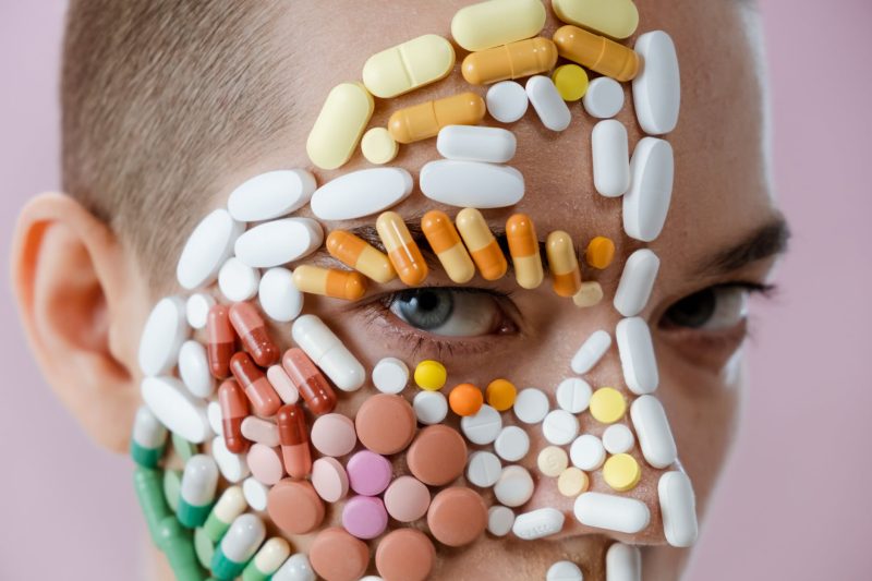 assorted medicines surrounding a person s eye
