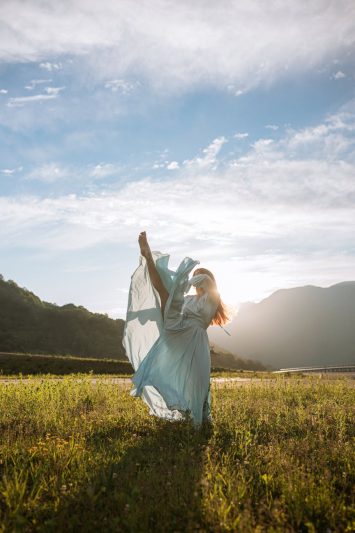 photo of a woman dancing with her leg up