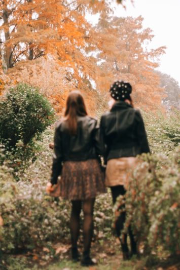 women walking in the garden