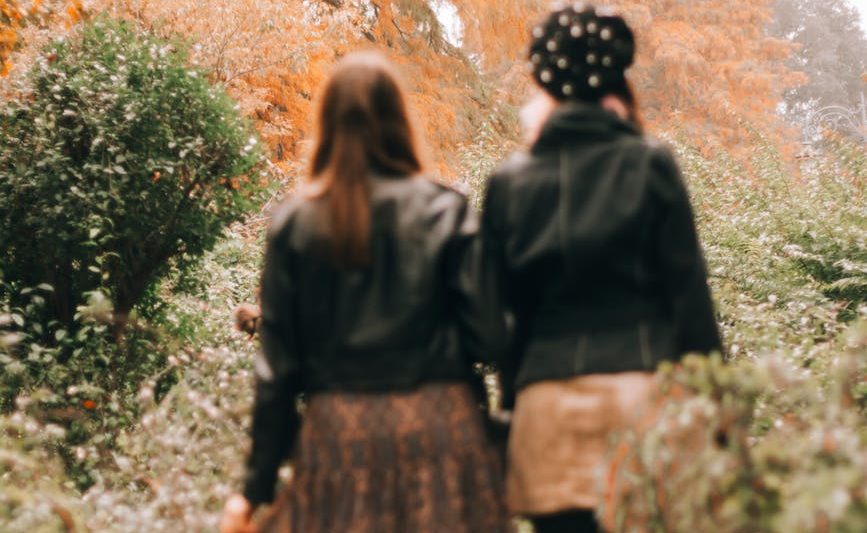 women walking in the garden