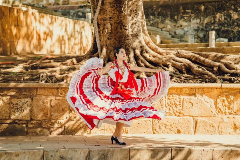 woman dancing on city street