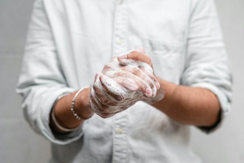 person washing hands