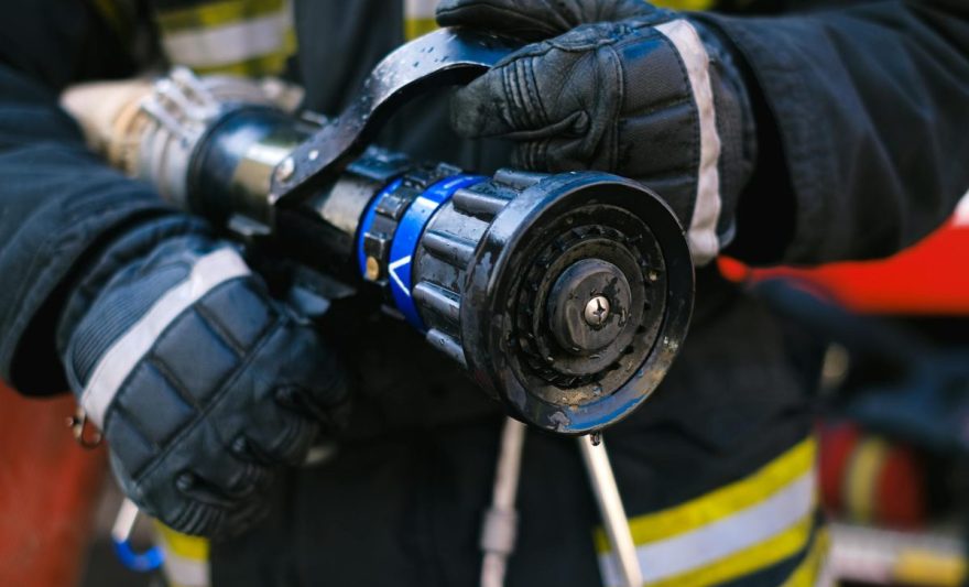 firefighter holding hose