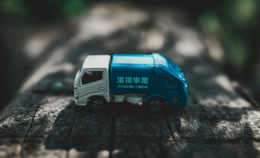 toy car on wooden surface in park