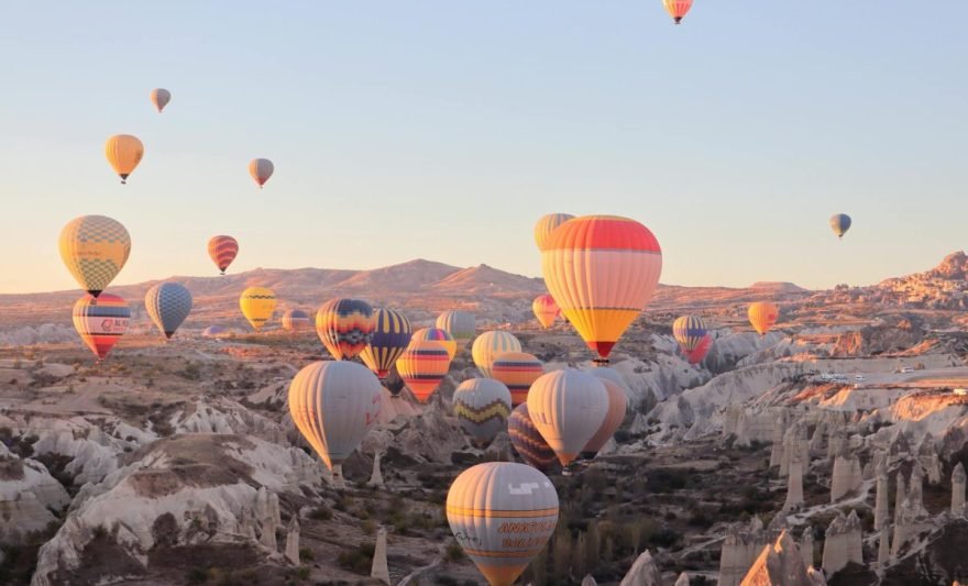 hot air balloons over cappadocia at sunrise