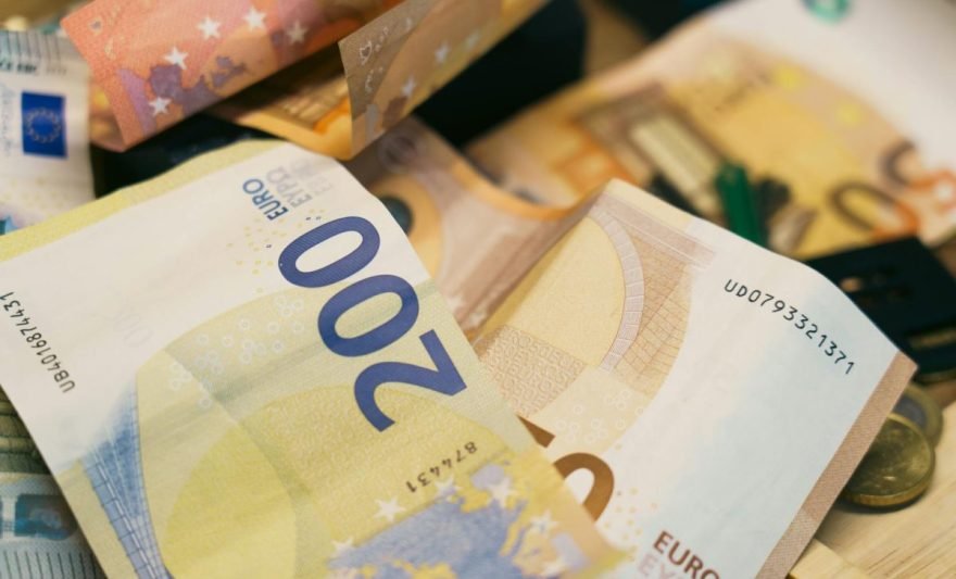 euro banknotes in a pile indicating wealth and finance