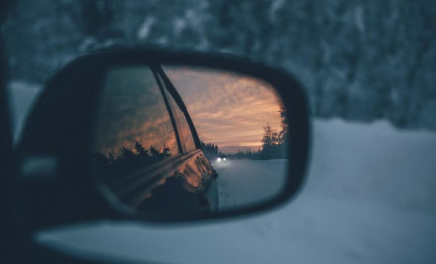 selective focus photography of wing mirror