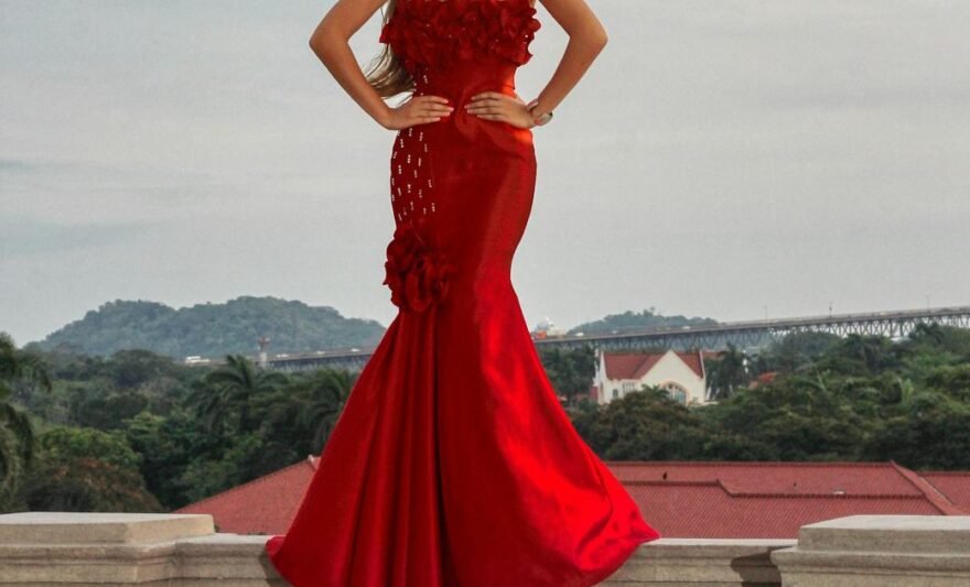woman posing in red dress
