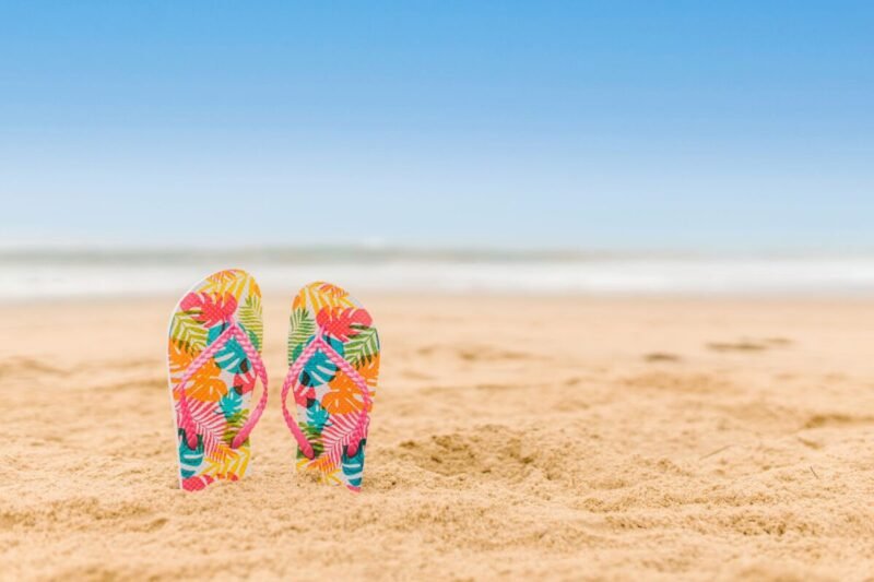 colorful flip flops slipper in the beach san