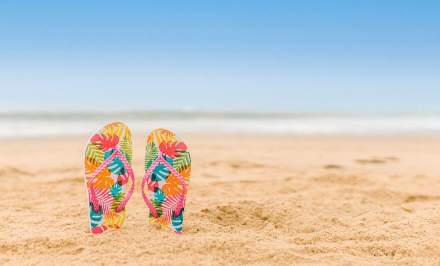 colorful flip flops slipper in the beach san