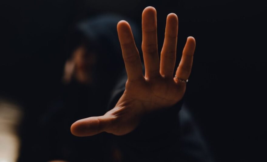 close up of the hand with a ring