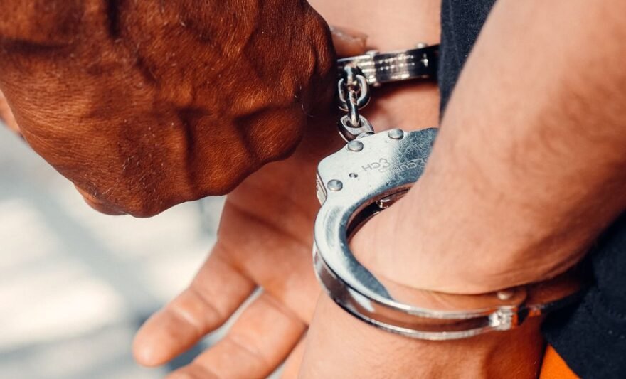 a person in handcuffs
