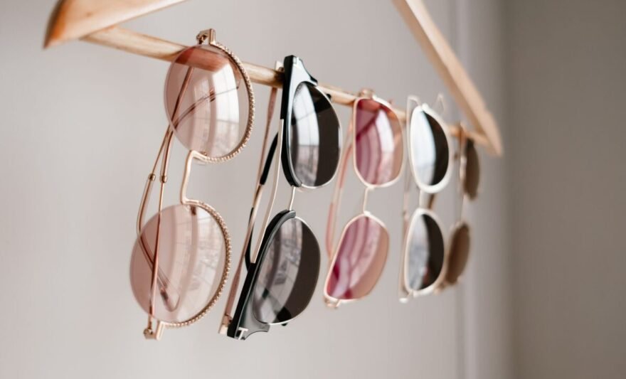 sunglasses hanging on a hanger