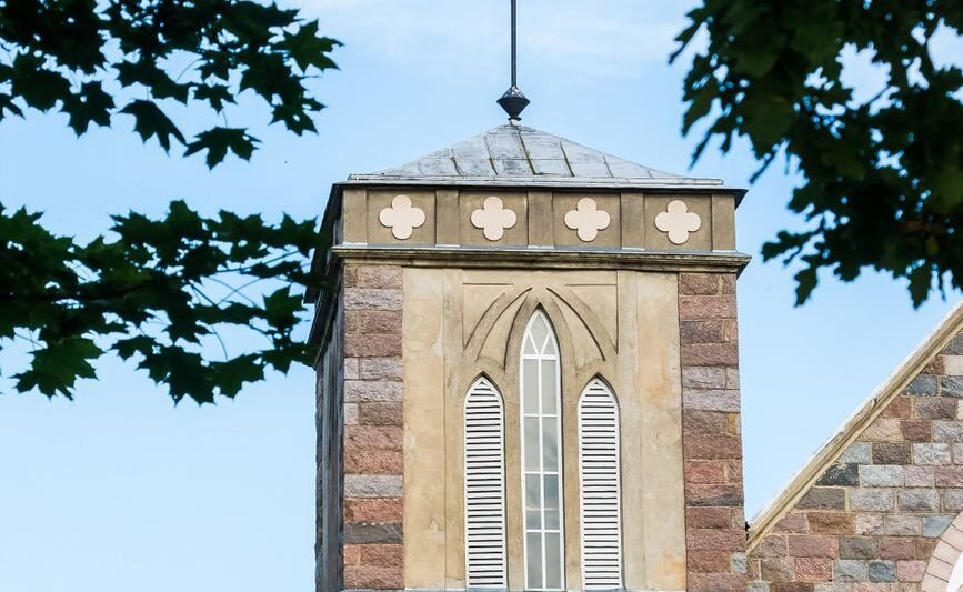 historic stone church facade with gothic windows